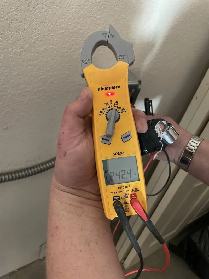Voltage testing with clamp meter during Circuit Breaker Repair in Westfield